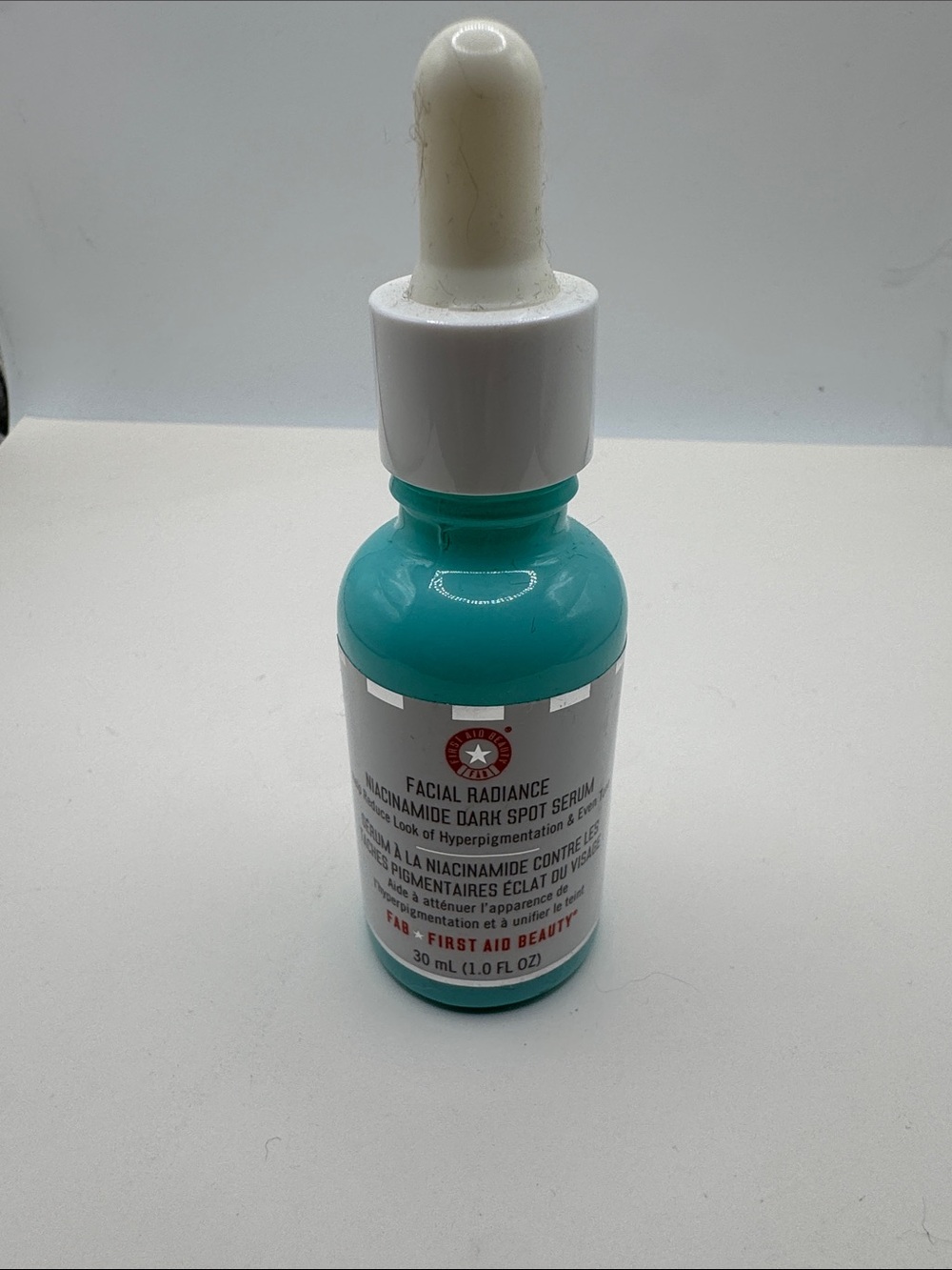 First Aid Beauty Facial Radiance Serum - Teal and White Dropper Bottle